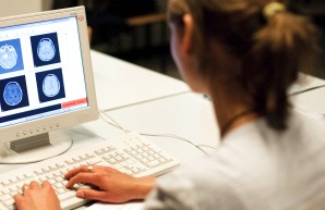 woman in front of a computer screen