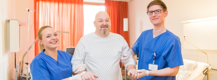 inpatient accompanied by two nurses